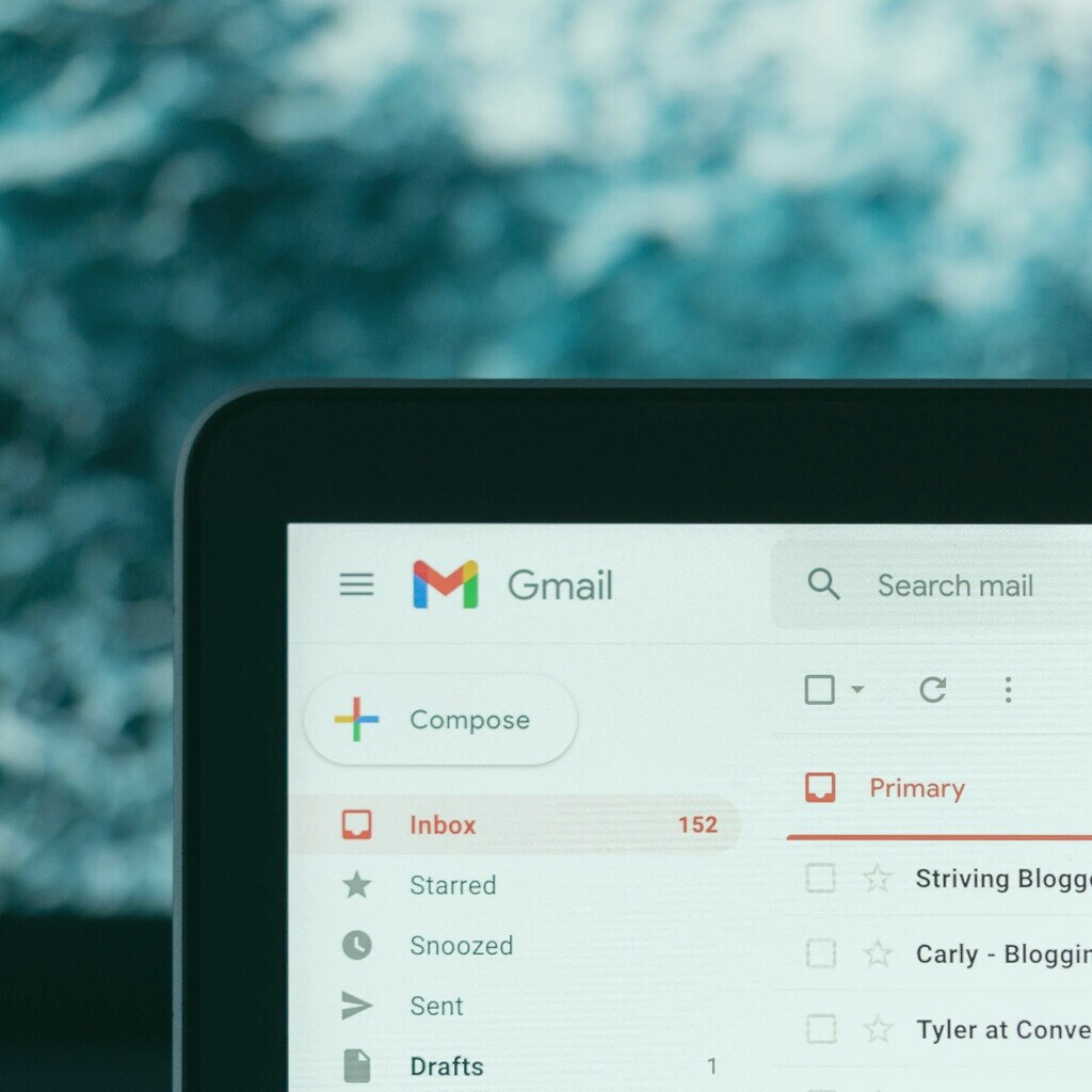 Gmail inbox on a laptop screen showing a high unread count